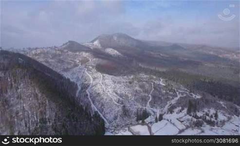 Aerial footage of beautiful winter landscape in the mountains.