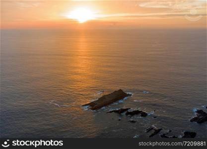 Aerial from a beautiful sunset at Arifana in Portugal
