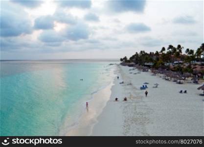 Aerial from a beautiful sunset at Manchebo beach on Aruba island in the Caribbean sea
