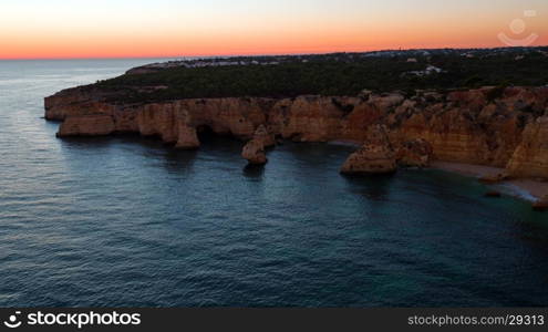 Aerial from famous beach Praia da Marinha in the Algarve Portugal at sunset