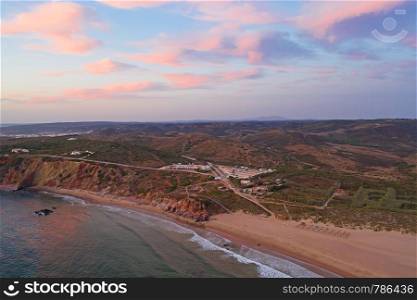 Aerial from Praia do Amado at the west coast in Portugal at sunset