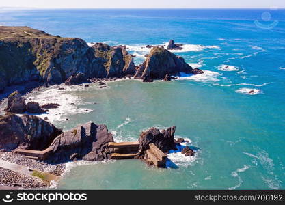 Aerial from Rocks and ocean near Azenha do Mar on the west coast in Portugal