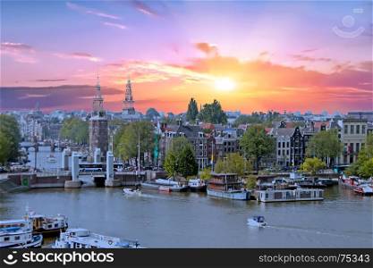 Aerial from the city Amsterdam in the Netherlands at sunset