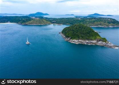Aerial island view of Ko Man, Thailand. View Amazing view to Catamaran cruising in open sea at windy day.