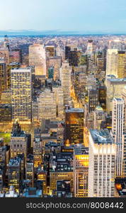 Aerial New York City skyline urban skyscrapers at dusk, USA.