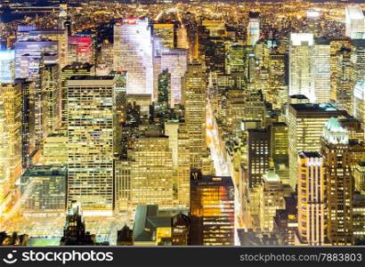 Aerial New York City skyline urban skyscrapers at night, USA.