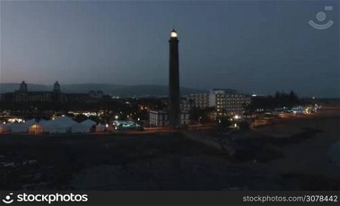 Aerial night view of Gran Canaria Island. Maspalomas Lighthouse at the southern end of the island. Spain
