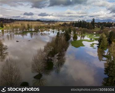 Aerial of extreme flooding on golf course after rain storm