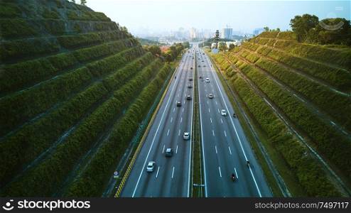 Aerial of highway leading into the Kuala Lumpur city ,Malaysia .