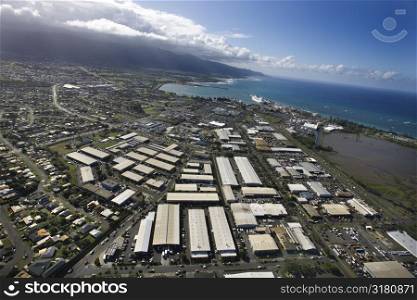 Aerial of Maui coastline with buildings and roads.