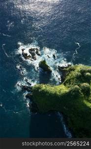 Aerial of rocky coast on Pacific ocean in Maui, Hawaii.