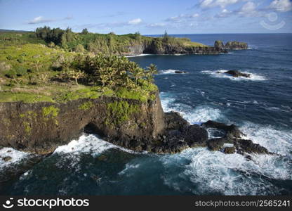 Aerial of rocky coast on Pacific ocean in Maui, Hawaii.