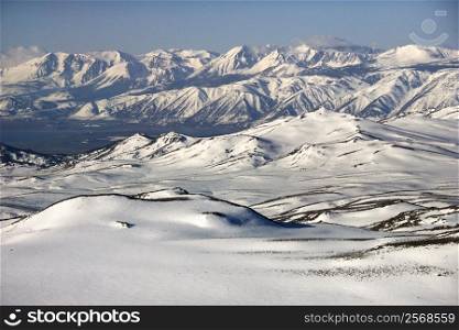 Aerial of snow covered mountain range in California, USA.