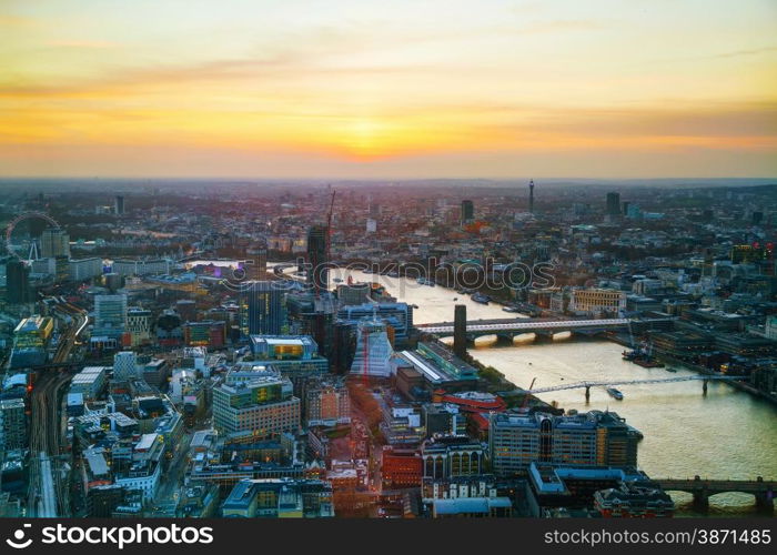 Aerial overview of London city at sunset