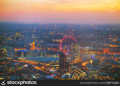 Aerial overview of London city at sunset