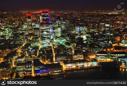 Aerial overview of the City of London financial ddistrict at night
