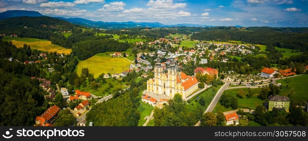 Aerial panoram of Baroque Mariatrost Basilica on top of the Purberg hill in Mariatrost, a district of Graz. Travel destination, famous turist spot. Aerial panoram of Baroque Mariatrost Basilica on top of the Purberg hill in Mariatrost, a district of Graz.