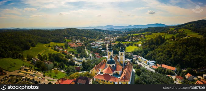 Aerial panoram of Baroque Mariatrost Basilica on top of the Purberg hill in Mariatrost, a district of Graz. Travel destination, famous turist spot. Aerial panoram of Baroque Mariatrost Basilica on top of the Purberg hill in Mariatrost, a district of Graz.