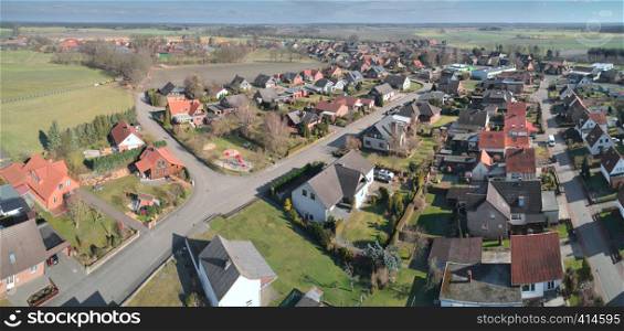 Aerial panorama of a small village in the Luneburger Heide near Hamburg, panoramic aerial view