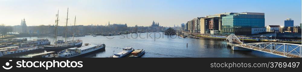 Aerial panorama of Amsterdam old town at sunset