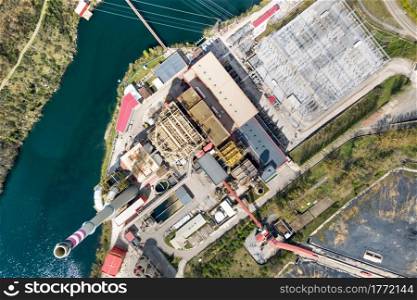 Aerial panorama of industrial area with chimneys of thermal power plant or station. High quality photo.. Aerial panorama of industrial area with chimneys of thermal power plant or station.