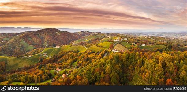 Aerial panorama of Vineyard on an Austrian countryside in Kitzeck with a church in the background. Aerial panorama of Vineyard on an Austrian countryside with a church in the background
