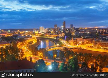 Aerial panoramic cityscape with skyscrapers of New Center of Vilnius from Gediminas Tower at night, Lithuania, Baltic states.