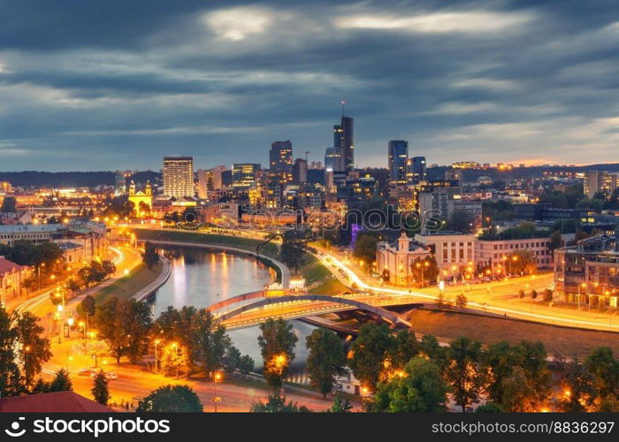 Aerial panoramic cityscape with skyscrapers of New Center of Vilnius from Gediminas Tower in the cloudy evening, Lithuania, Baltic states.. Panorama New Center of Vilnius, Lithuania