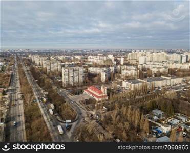 Aerial panoramic photography from the drone, bird&rsquo;s eye view to modern city district with urban infrastructure and residential buildings of the city Kiev.. A bird&rsquo;s eye view, aerial panoramic view from drone to the Darnyts&rsquo;kyi district of Kiev, Ukraine at sunset in the summer.