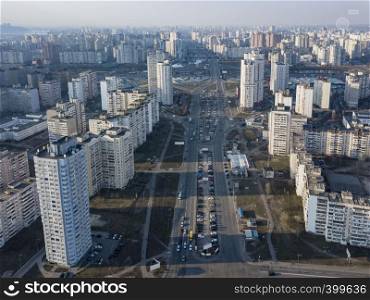 Aerial panoramic photography from the drone, bird's eye view to Pozniaky district with modern building of the city Kiev Ukraine.. A bird's eye view from drone to the Darnyts'kyi district of Kiev, Ukraine with modern buildings in a spring sunny day.