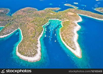 Aerial panoramic view of Palmizana, sailing cove and turquoise beach on Pakleni Otoci islands, archipelago of Hvar in Croatia 