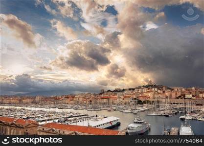 Aerial panoramic view on basilica of Notre Dame de la Garde and old port in Marseille, France. panoramic view on basilica of Notre Dame de la Garde and old port in Marseille, France