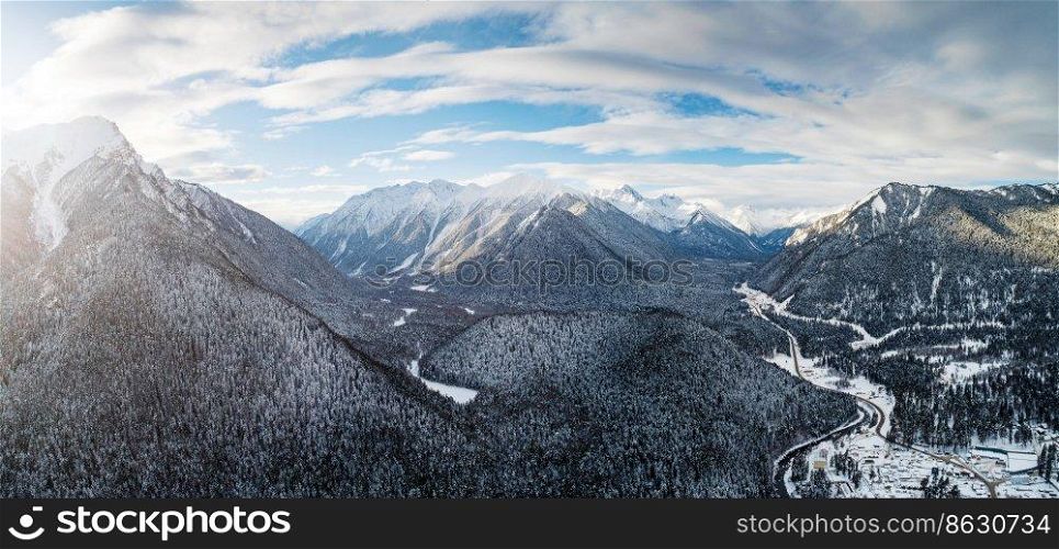 Aerial panoramic view on the mountain valley in winter