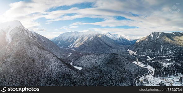 Aerial panoramic view on the mountain valley in winter