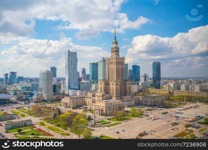 Aerial photo of Warsaw city skyline in Poland at sunset