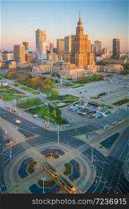 Aerial photo of Warsaw city skyline in Poland at sunset