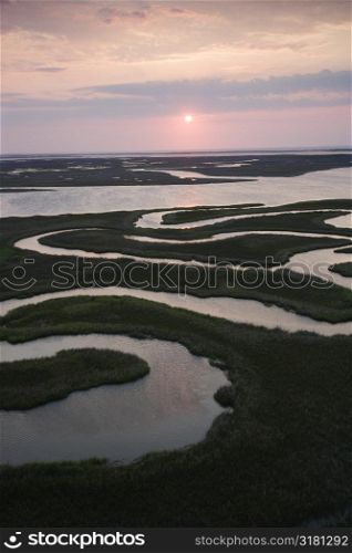 Aerial scenic Bald Head Island North Carolina landscape of marshland during sunrise.