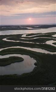 Aerial scenic Bald Head Island North Carolina landscape of marshland during sunrise.
