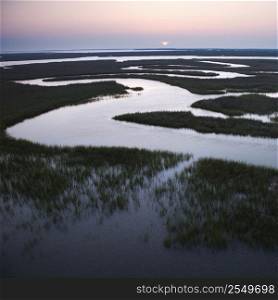 Aerial scenic view of winding waterway in marshland at Baldhead Island, North Carolina.