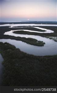 Aerial scenic view of winding waterway in marshland at Baldhead Island, North Carolina.