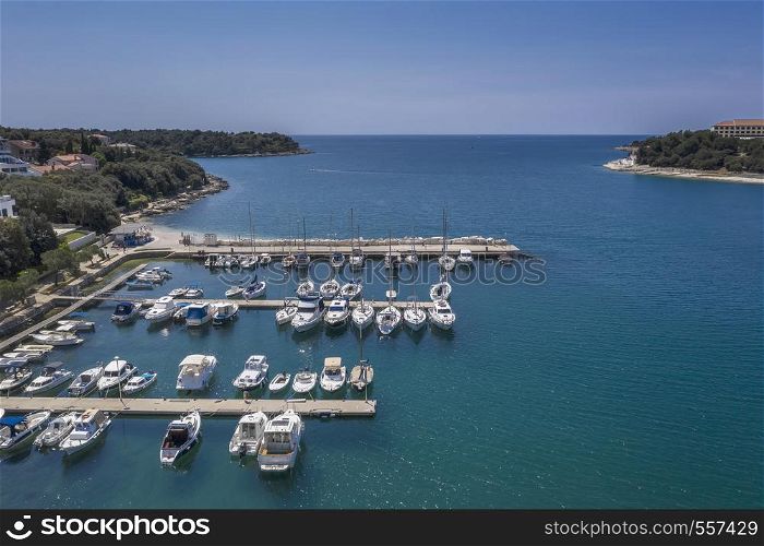 Aerial shot of marina in Pjescana Uvala and Verudela resort in Pula, Croatia