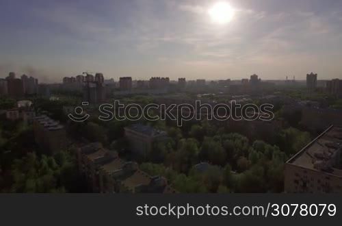 Aerial shot of residential district among the green trees in Moscow, Russia