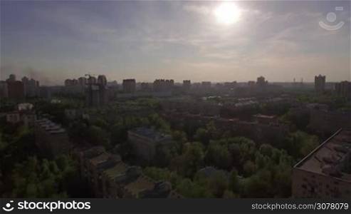 Aerial shot of residential district among the green trees in Moscow, Russia