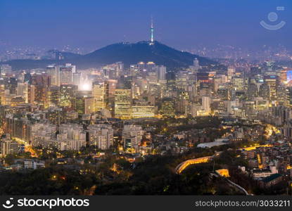 Aerial Sunset and Night view of Seoul Downtown cityscape with Seoul Tower in South Korea. Night view of Seoul Downtown cityscape