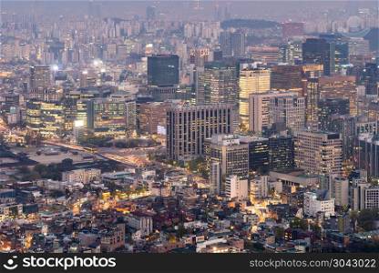 Aerial Sunset and Night view of Seoul Downtown cityscape with Seoul Tower in South Korea. Night view of Seoul Downtown cityscape