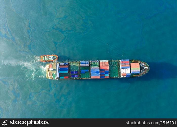 Aerial top view container cargo ship in import export business commercial trade logistic and transportation of international by container cargo ship in the open sea.