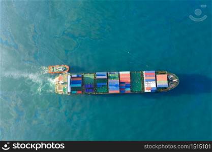 Aerial top view container cargo ship in import export business commercial trade logistic and transportation of international by container cargo ship in the open sea.