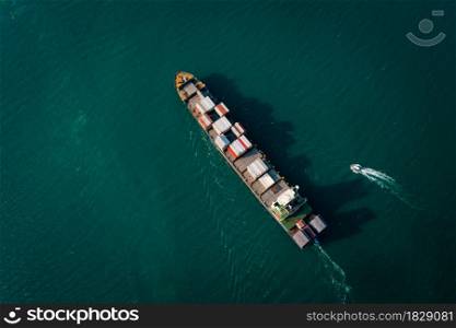 Aerial top view container cargo ship in import export business Service commercial trade logistic and transportation of international by container cargo ship in the open sea,