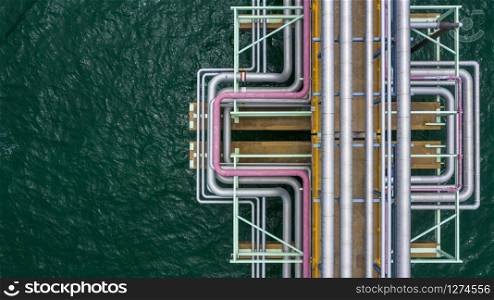 Aerial top view gas and oil pipe line in the ocean.