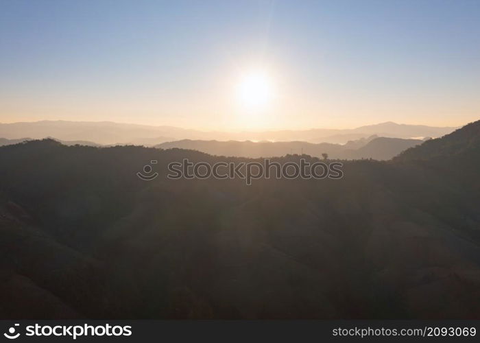 Aerial top view of forest trees and green mountain hills. Nature landscape background, Thailand.